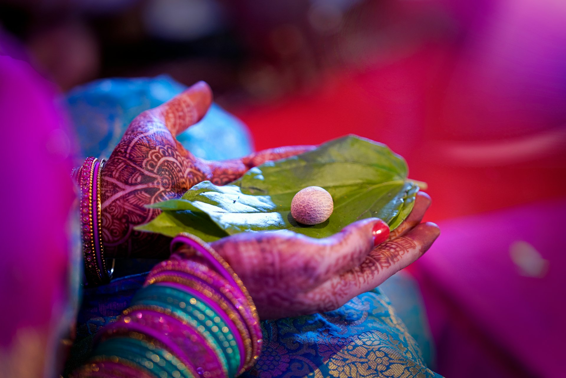 pink blue and green textile